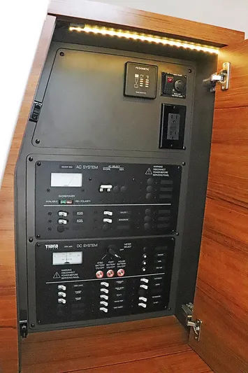  Yacht Photos Pics Electrical control panel inside 2021 Tiara Sport 34 LX boat, featuring AC and DC systems.