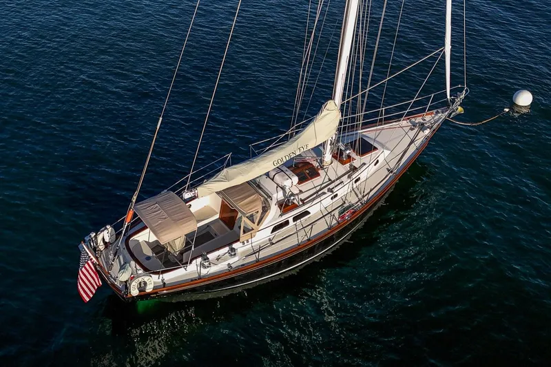 Golden Eye Yacht Photos Pics Hinckley Sou'wester 42 MKII sailboat from 1996 on calm blue water.