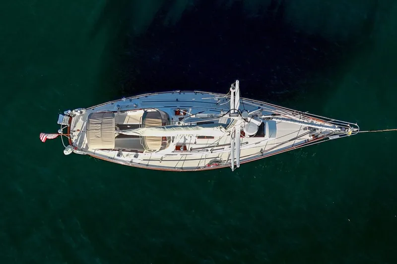 Golden Eye Yacht Photos Pics Aerial view of 1996 Hinckley Sou'wester 42 MKII sailboat on calm water.