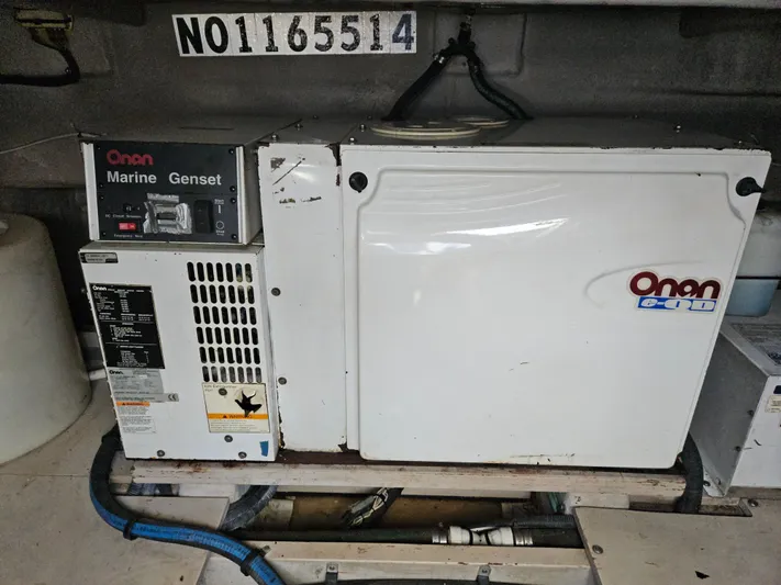 Nautical Dreamer Yacht Photos Pics Onan Marine Genset in 2005 Sea Ray 500 Sundancer yacht engine room.