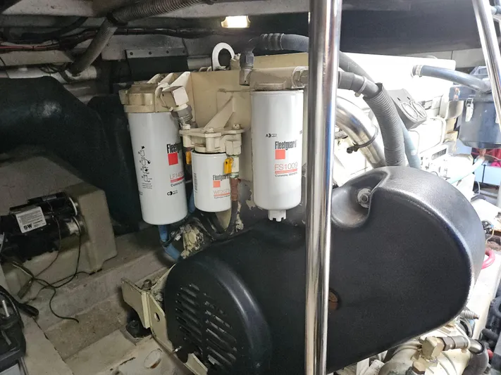 Nautical Dreamer Yacht Photos Pics Engine room of 2005 Sea Ray 500 Sundancer with filters and mechanical components.