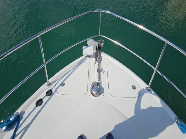 Nautical Dreamer Yacht Photos Pics Bow of 2005 Sea Ray 500 Sundancer yacht with stainless steel railings.