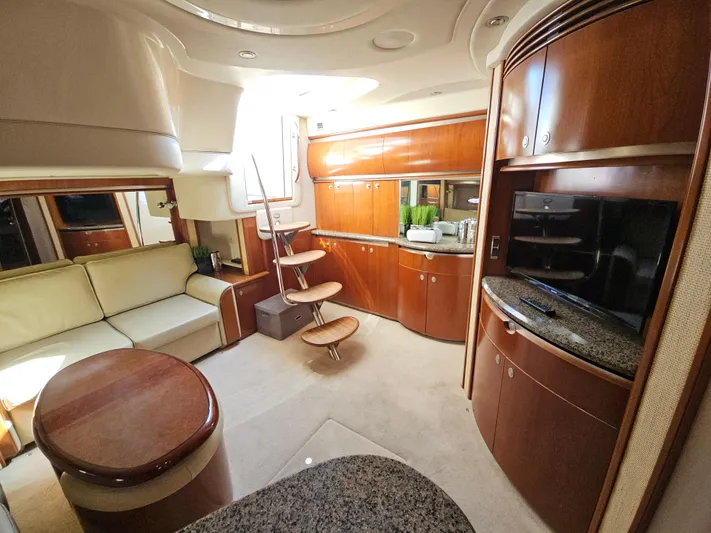 Nautical Dreamer Yacht Photos Pics Luxurious interior of 2005 Sea Ray 500 Sundancer yacht with elegant wood finishes.