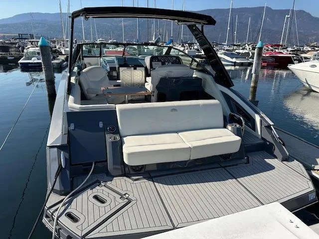 Yacht Photos Pics 2017 Cruisers Yachts 338 SOUTH BEACH at marina, featuring spacious seating and sleek design.