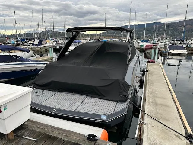  Yacht Photos Pics 2017 Cruisers Yachts 338 SOUTH BEACH docked at marina, covered with black tarp.