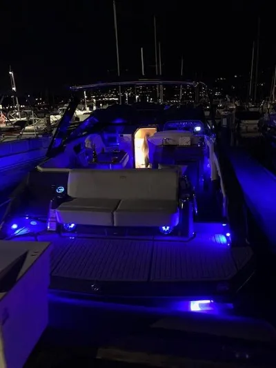  Yacht Photos Pics 2017 Cruisers Yachts 338 SOUTH BEACH with blue LED lights at night.