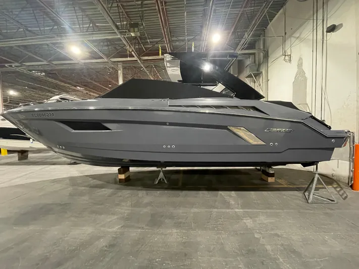  Yacht Photos Pics 2017 Cruisers Yachts 338 SOUTH BEACH, sleek design, displayed indoors.