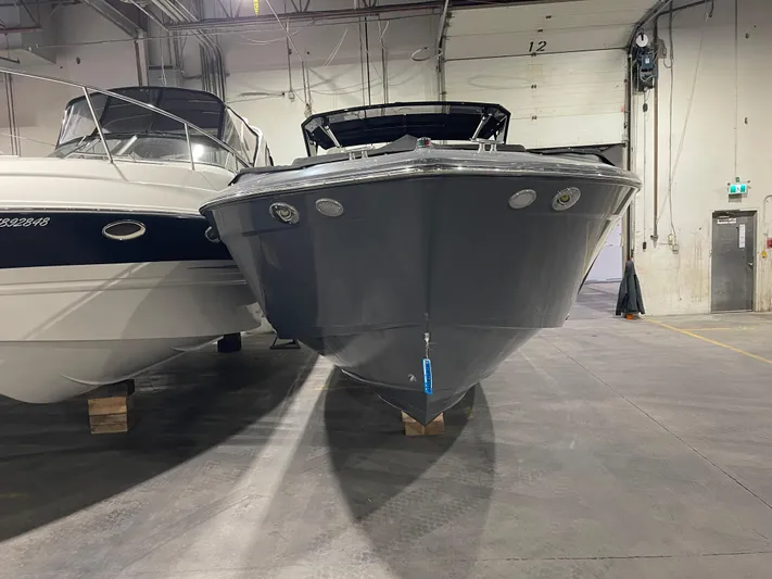  Yacht Photos Pics 2017 Cruisers Yachts 338 SOUTH BEACH in storage, front view, indoors.