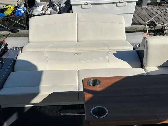  Yacht Photos Pics 2017 Cruisers Yachts 338 SOUTH BEACH interior seating with table and cup holders.