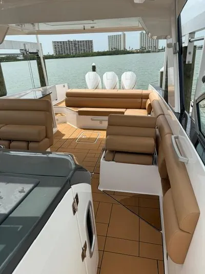  Yacht Photos Pics 2023 Aviara AV36 OB boat interior with tan seating and modern design.