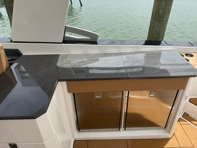  Yacht Photos Pics 2023 Aviara AV36 OB boat with sleek countertop and dual stainless steel refrigerators.