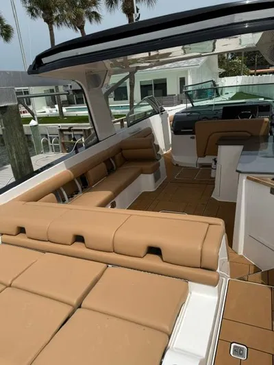 Yacht Photos Pics 2023 Aviara AV36 OB boat interior with tan seating and modern design.