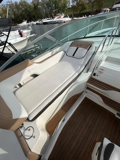  Yacht Photos Pics 2016 Sea Ray 350 Sundancer boat with sleek seating and wooden deck.