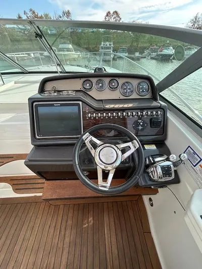 Yacht Photos Pics 2016 Sea Ray 350 Sundancer helm with modern controls and navigation system.