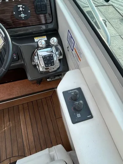  Yacht Photos Pics Control panel of 2016 Sea Ray 350 Sundancer boat with joystick and throttle.