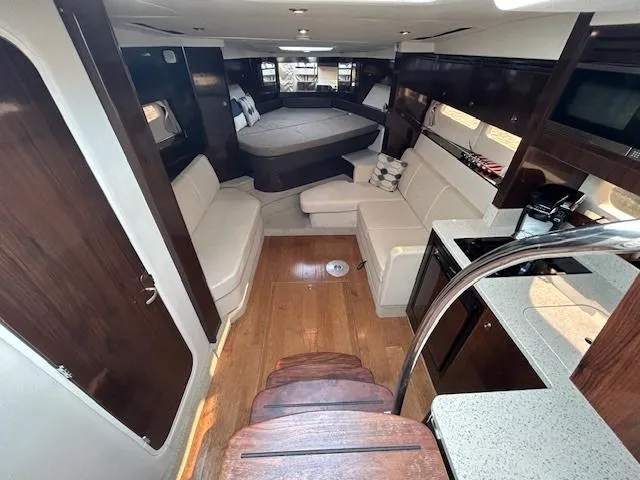  Yacht Photos Pics Luxurious interior of 2016 Sea Ray 350 Sundancer yacht with modern amenities.