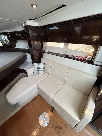  Yacht Photos Pics Interior of 2016 Sea Ray 350 Sundancer with modern seating and wood accents.