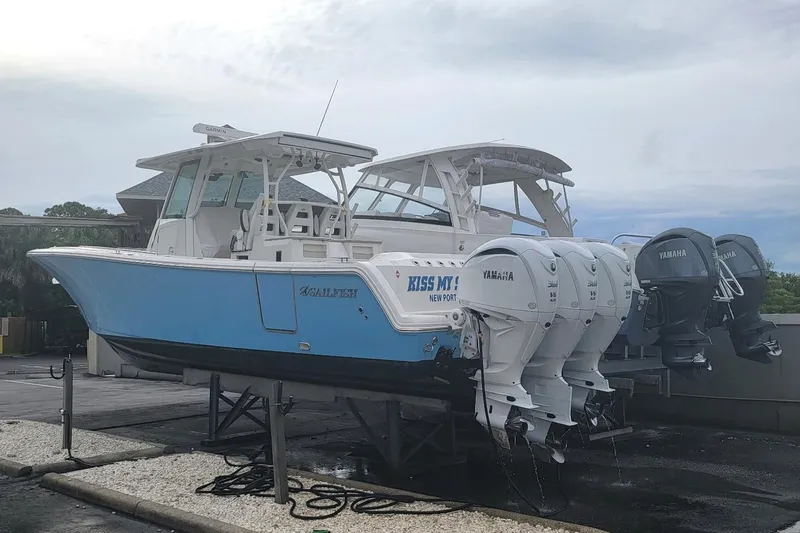  Yacht Photos Pics 2022 Sailfish 360 CC boat with Yamaha engines on a dock.