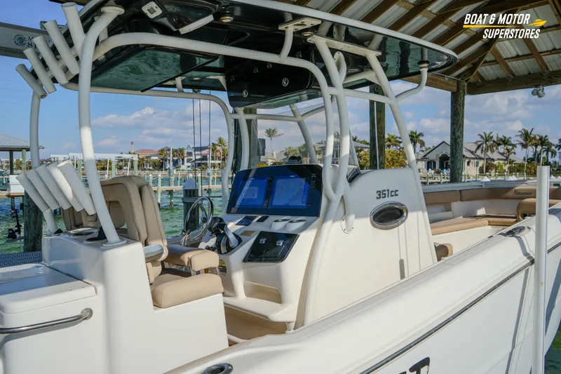  Yacht Photos Pics 2018 Key West Billistic 351 Center Console boat docked at marina, featuring modern helm.