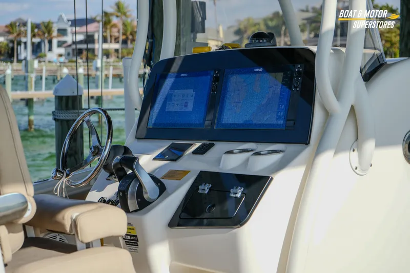  Yacht Photos Pics 2018 Key West Billistic 351 Center Console helm with dual navigation screens and steering wheel.