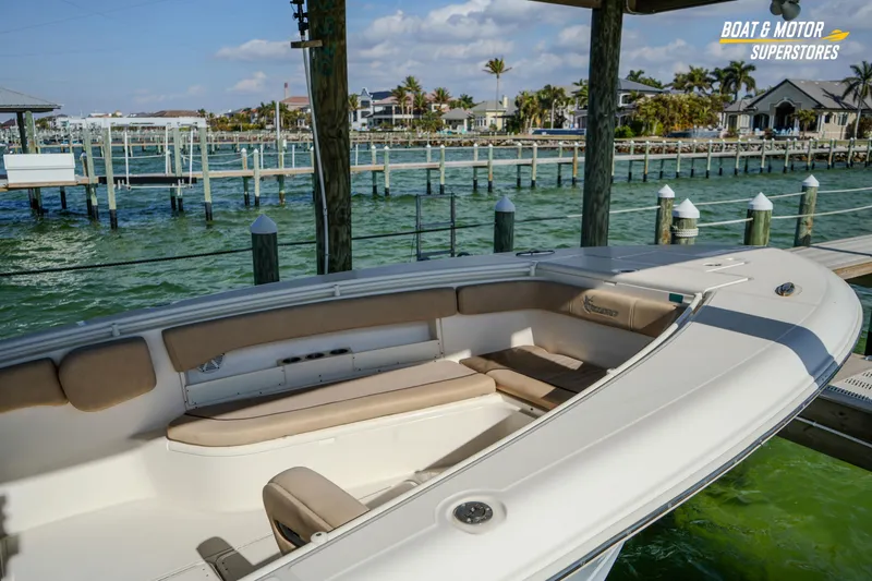  Yacht Photos Pics 2018 Key West Billistic 351 Center Console docked by waterfront homes.