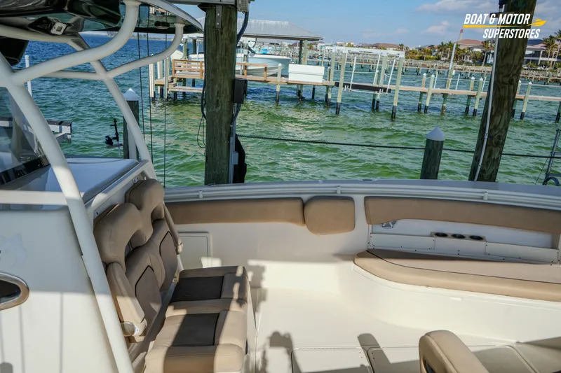  Yacht Photos Pics 2018 Key West Billistic 351 Center Console boat interior at a marina.