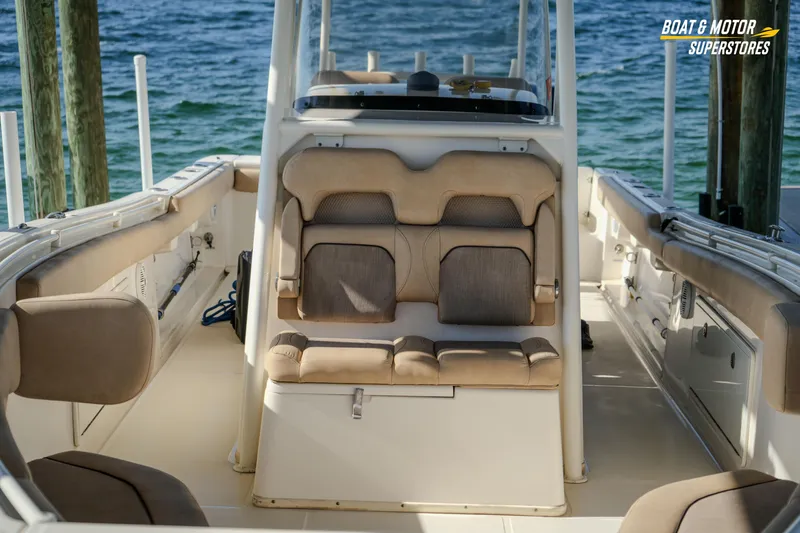  Yacht Photos Pics 2018 Key West Billistic 351 Center Console interior with seating, docked by the water.