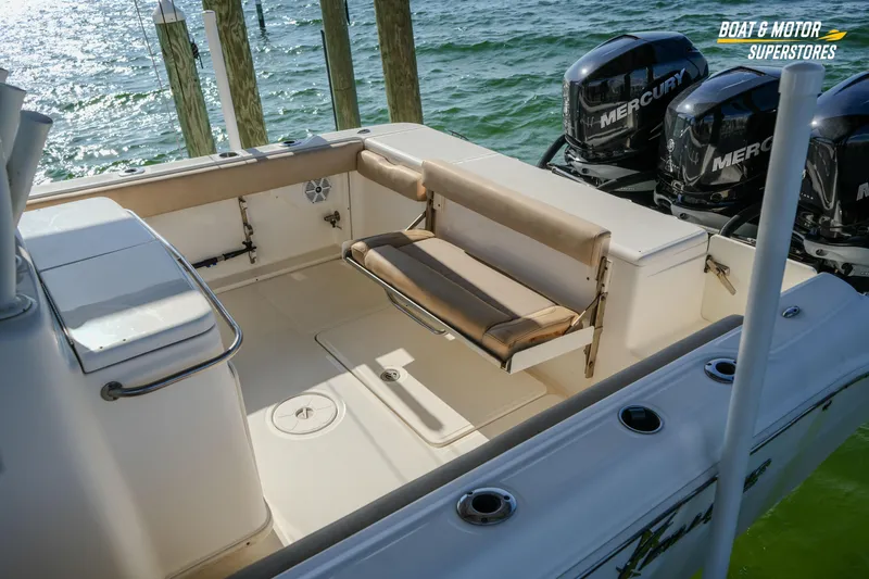  Yacht Photos Pics 2018 Key West Billistic 351 Center Console boat with Mercury engines, docked by the water.