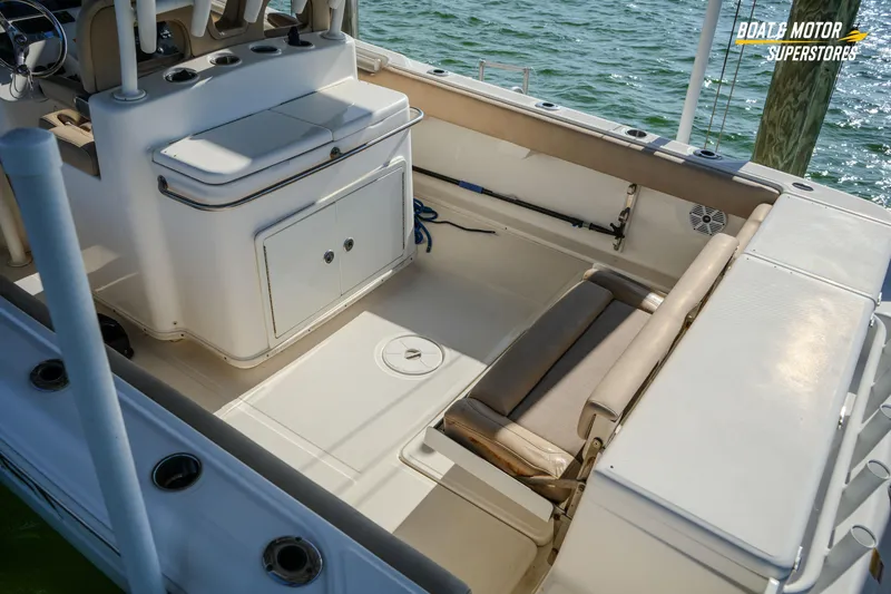  Yacht Photos Pics 2018 Key West Billistic 351 Center Console interior with seating and storage, docked by water.