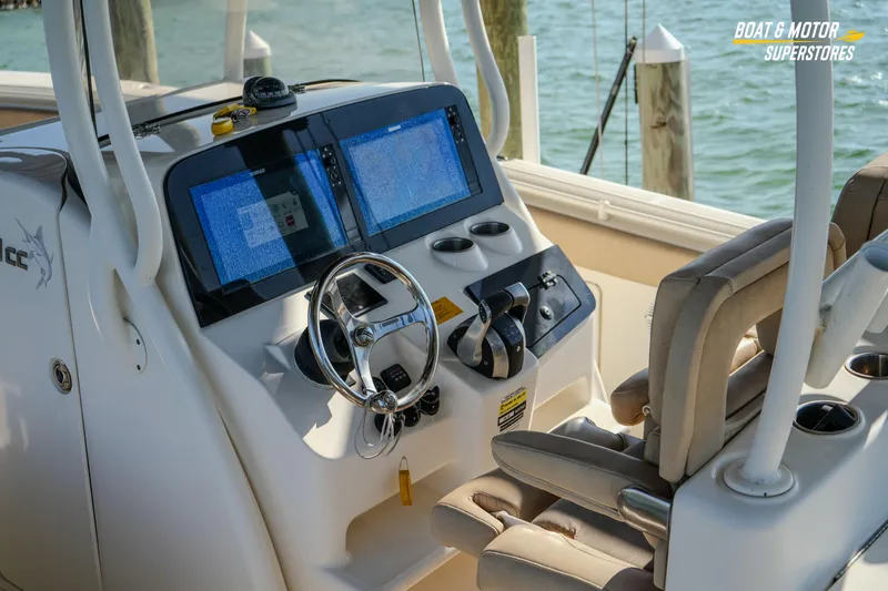  Yacht Photos Pics 2018 Key West Billistic 351 Center Console helm with dual screens and steering wheel.