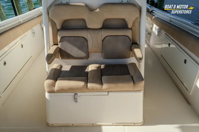  Yacht Photos Pics 2018 Key West Billistic 351 Center Console seating area with cushioned seats and storage.
