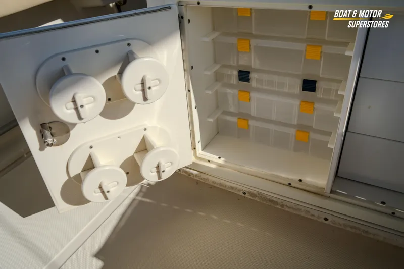  Yacht Photos Pics 2018 Key West Billistic 351 Center Console storage compartment with rod holders and tackle storage.