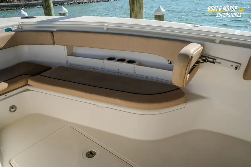  Yacht Photos Pics 2018 Key West Billistic 351 Center Console interior seating with beige cushions, dockside view.