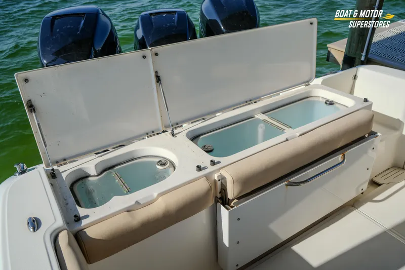  Yacht Photos Pics 2018 Key West Billistic 351 Center Console with open storage compartments and triple outboard motors.