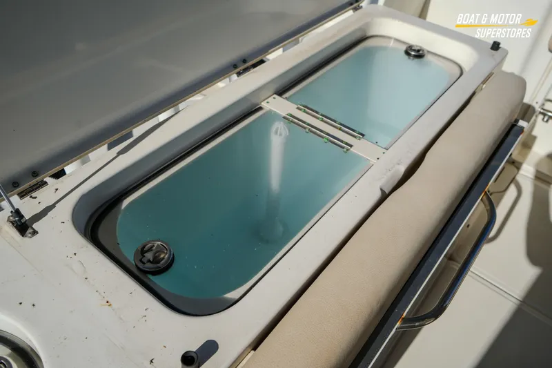  Yacht Photos Pics 2018 Key West Billistic 351 Center Console livewell with open lid and cushioned seating.