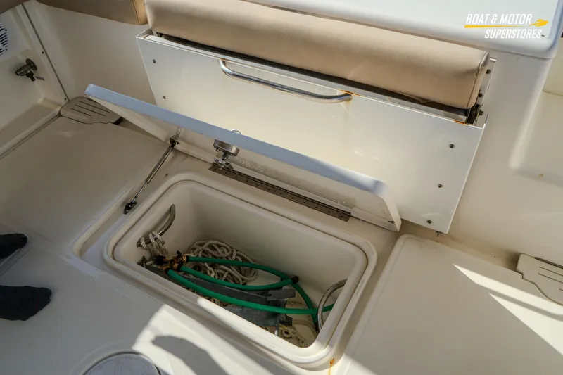 Yacht Photos Pics 2018 Key West Billistic 351 Center Console storage compartment with ropes and hoses.