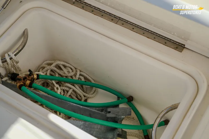  Yacht Photos Pics Storage compartment of 2018 Key West Billistic 351 Center Console with ropes and hoses.