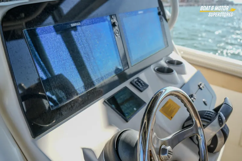  Yacht Photos Pics 2018 Key West Billistic 351 Center Console helm with dual displays and steering wheel.