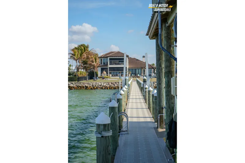  Yacht Photos Pics Dock leading to waterfront house, Key West Billistic 351 Center Console, 2018.