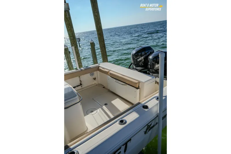  Yacht Photos Pics 2018 Key West Billistic 351 Center Console boat with Mercury engines, docked by the sea.