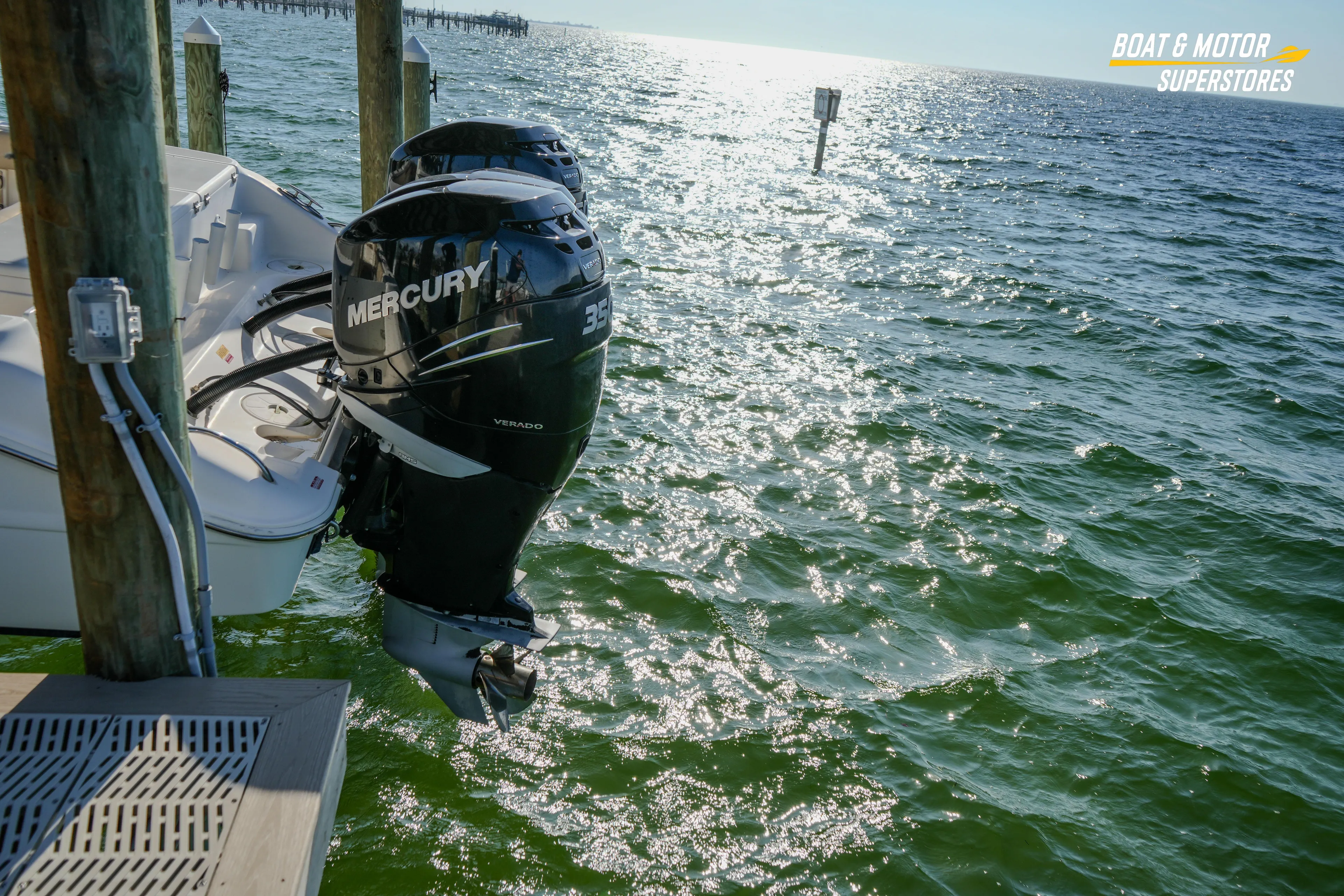  Yacht Photos Pics 2018 Key West Billistic 351 Center Console with Mercury engines docked by sparkling water.