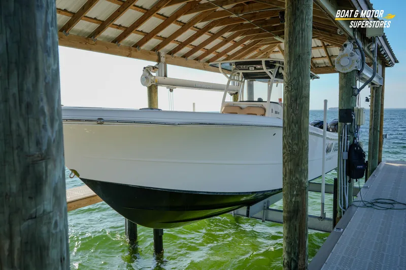  Yacht Photos Pics 2018 Key West Billistic 351 Center Console boat on lift at dockside.