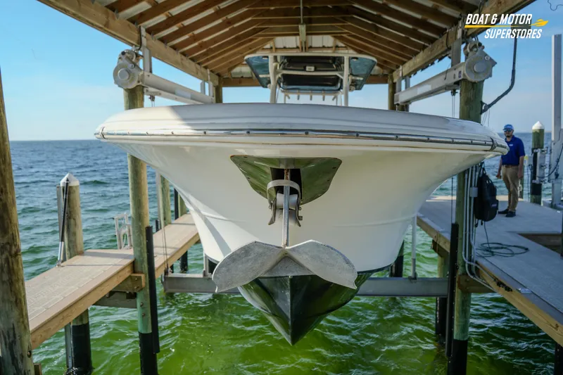  Yacht Photos Pics 2018 Key West Billistic 351 Center Console boat docked on a lift.