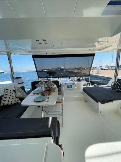 Matilda Mia Yacht Photos Pics Spacious 2015 Lagoon 52 yacht interior with dining area, cushions, and ocean view.
