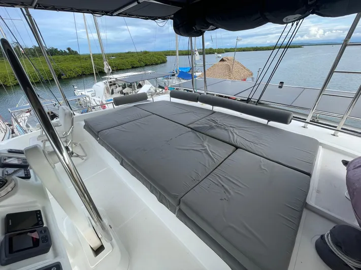 Matilda Mia Yacht Photos Pics Luxurious 2015 Lagoon 52 yacht deck with spacious sunbathing area and scenic water view.