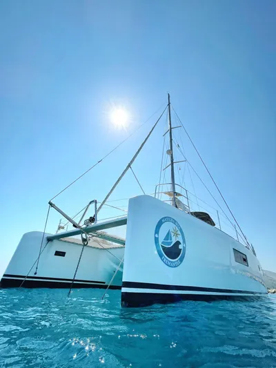 Matilda Mia Yacht Photos Pics 2015 Lagoon 52 catamaran sailing under clear blue sky.