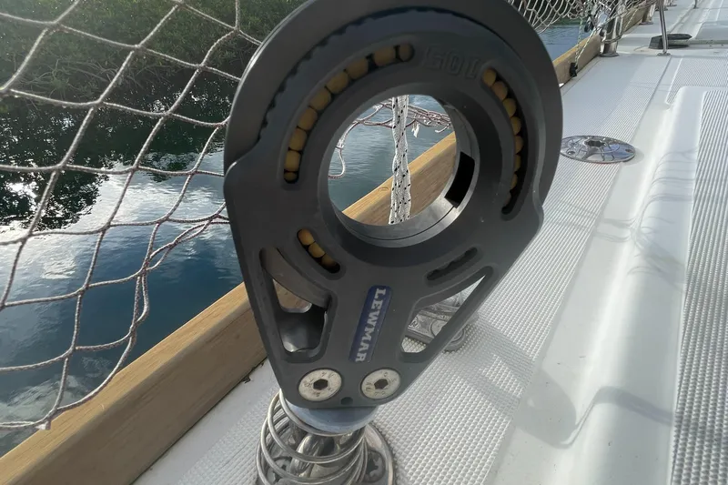 Matilda Mia Yacht Photos Pics Deck detail of a 2015 Lagoon 52 sailboat with rigging and netting.