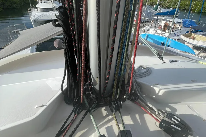 Matilda Mia Yacht Photos Pics Ropes and rigging on a 2015 Lagoon 52 catamaran deck in a marina.