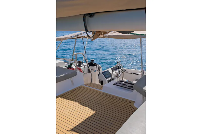 Ruckus Yacht Photos Pics 2021 Fountaine Pajot Elba 45 Catamaran deck with ocean view and helm station.