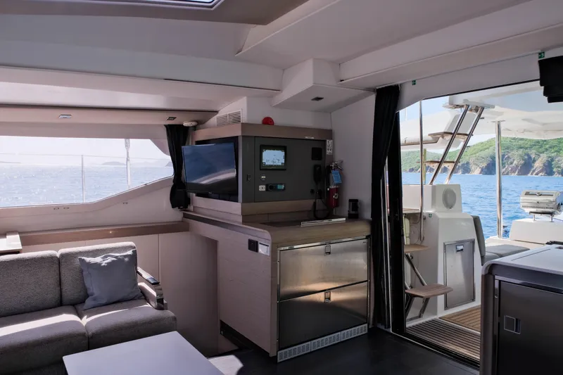 Ruckus Yacht Photos Pics Interior of 2021 Fountaine Pajot Elba 45 Catamaran with ocean view and modern amenities.